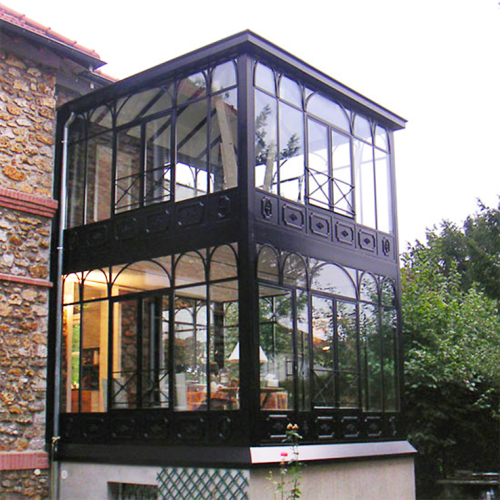 Véranda moderne en acier fabriquée en France par l'Atelier d'Alexandre