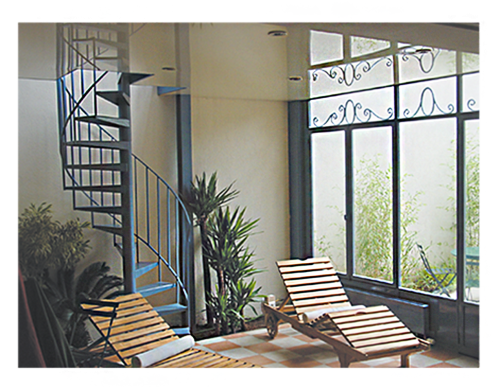 Escalier sur mesure en fer forgé fabriqué par l'Atelier d'Alexandre en France